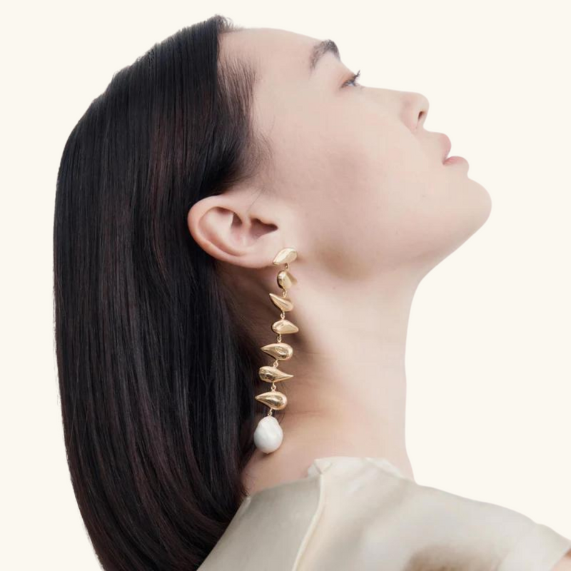 Dangling gold earrings | Leah