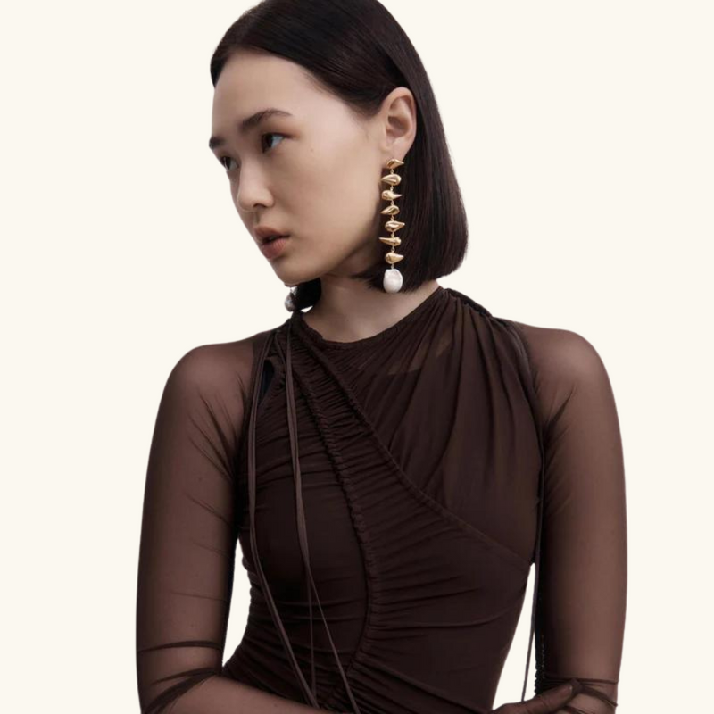 Dangling gold earrings | Leah