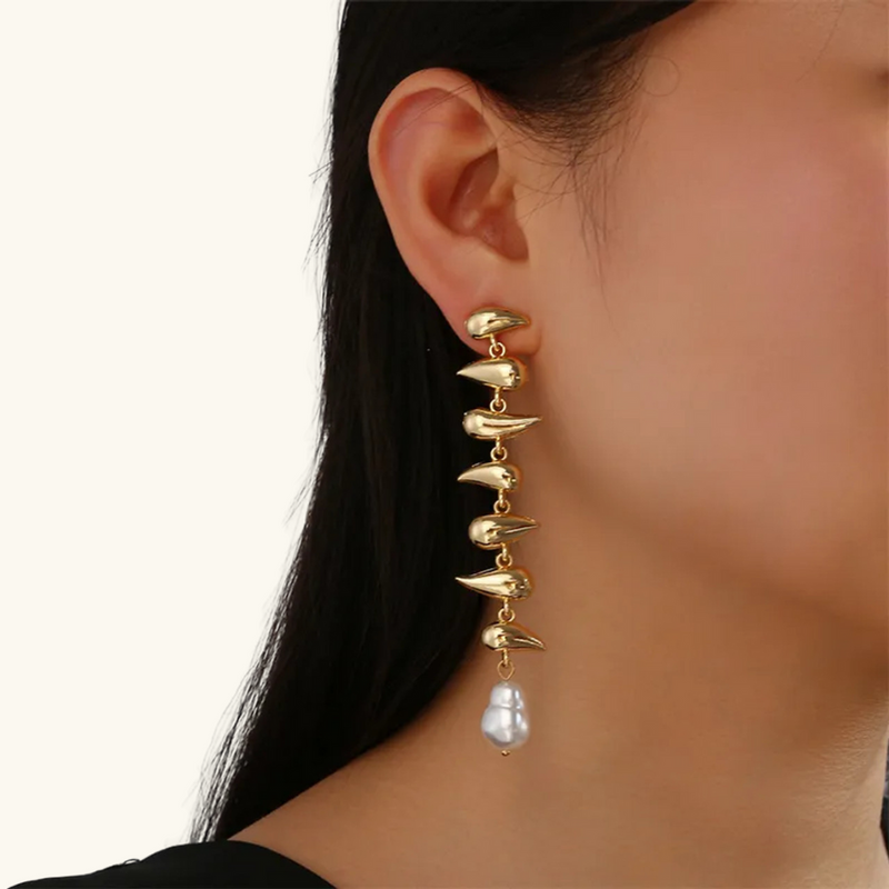 Dangling gold earrings | Leah