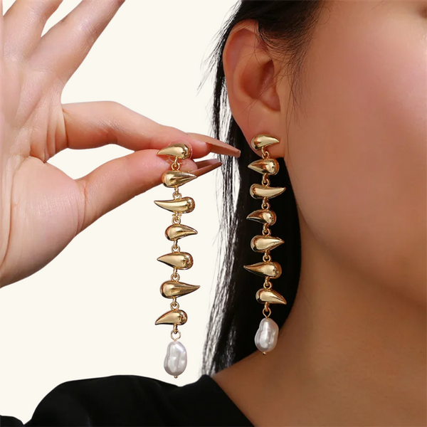 Dangling gold earrings | Leah